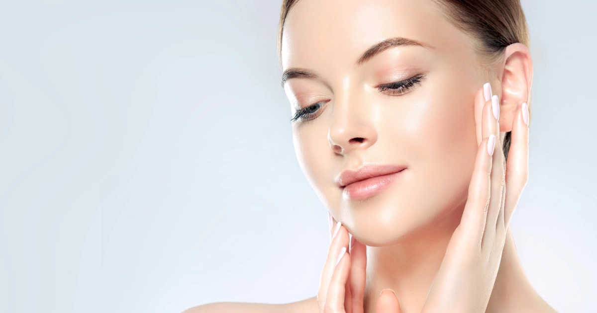Woman showing her face, highlighting smooth and glowing skin after Medical Aesthetics treatments in Austin, Texas (1)